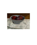 peaches in blue bowl
