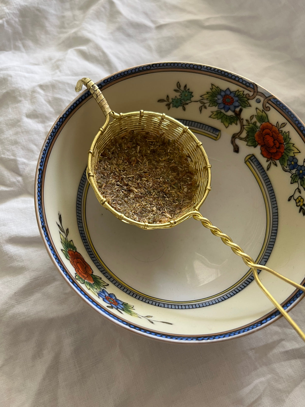 Woven brass tea strainer
