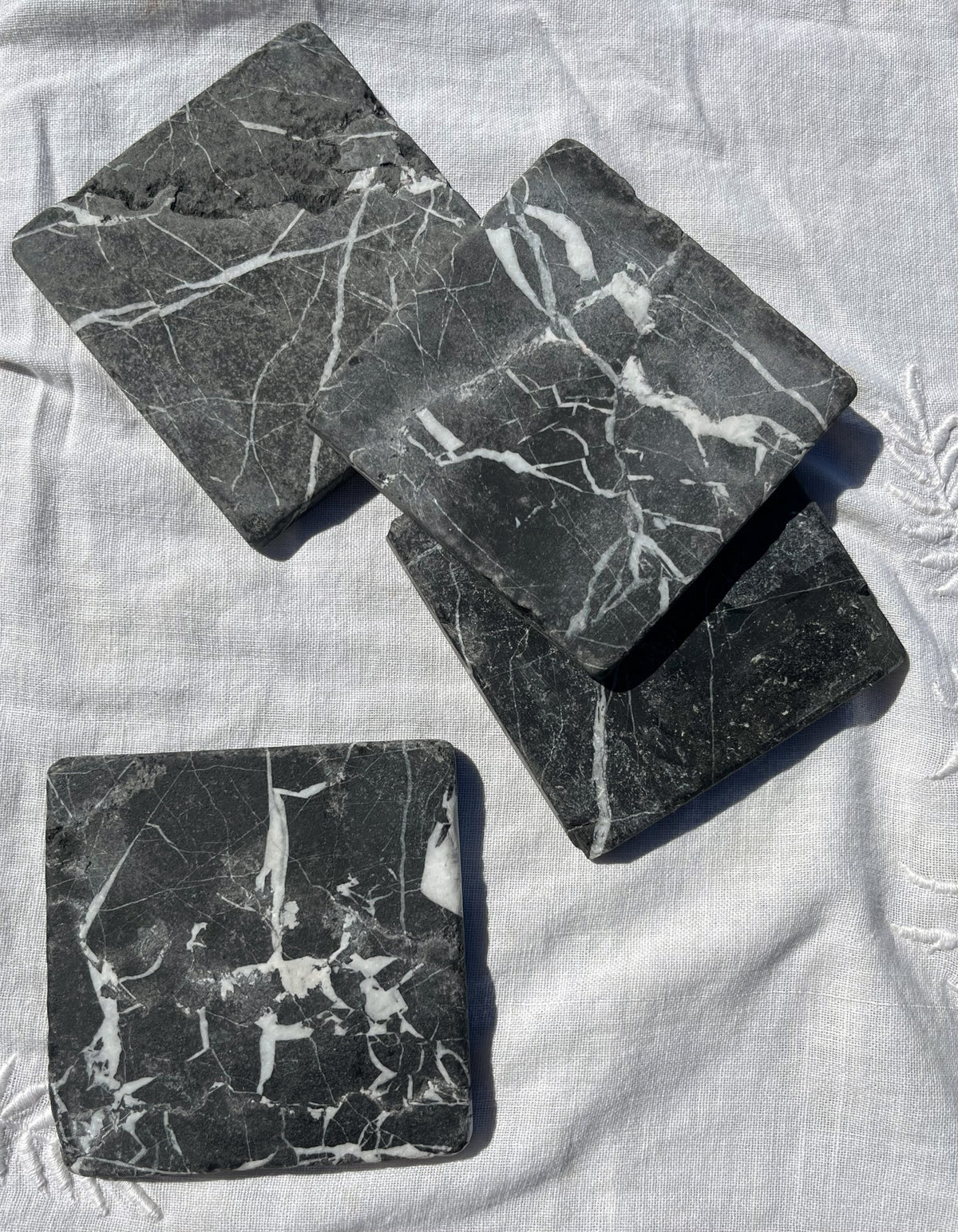 Honed marble coasters